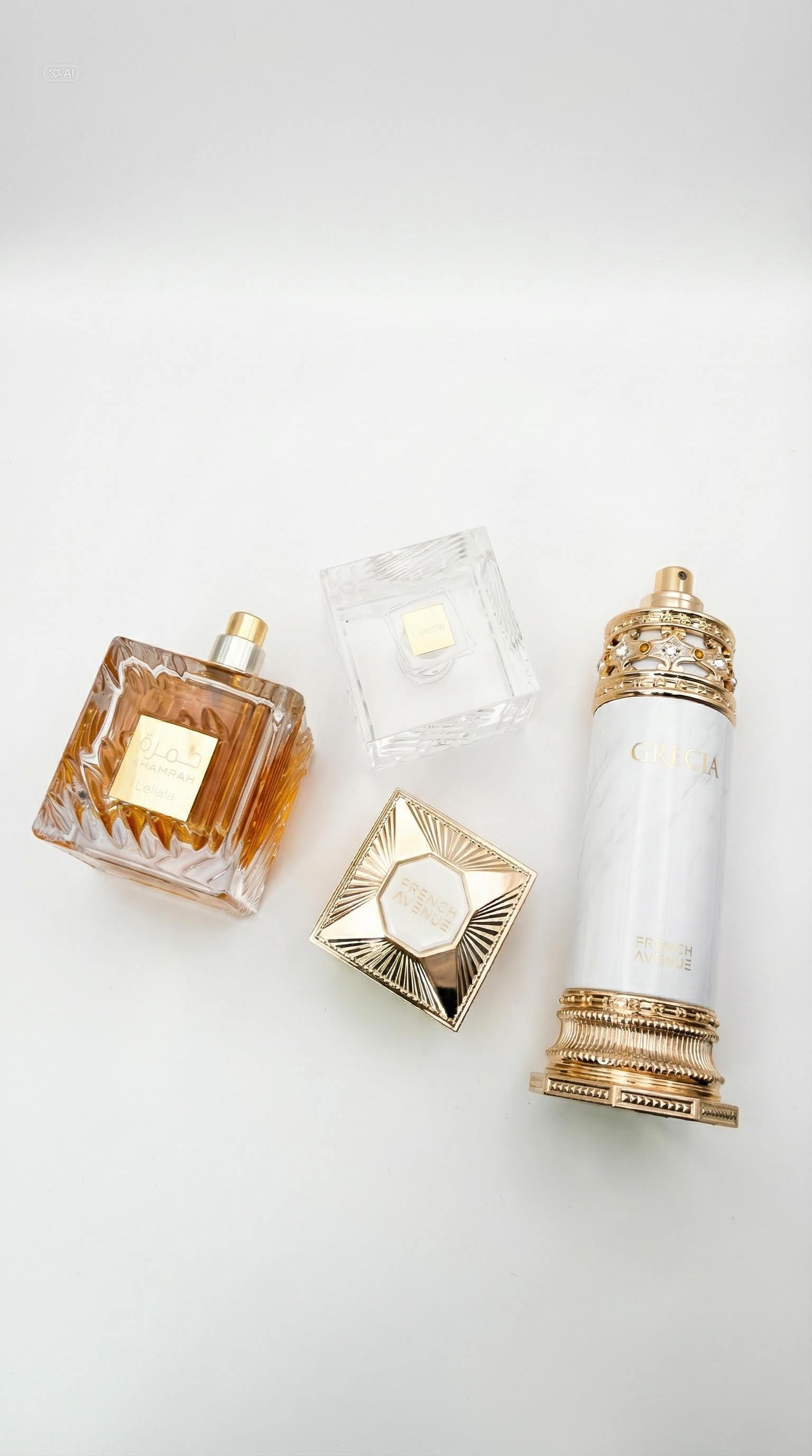 Flat lay of Grecia perfume with crystal and amber square flacons
